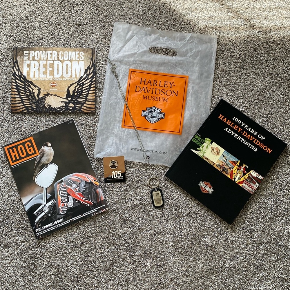 Harley Davidson collection of books, catalogues & jewelry.